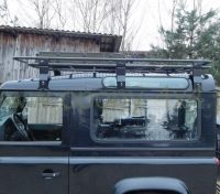 Portbagaj-Roof-Rack-cu-plasa-pentru-Land-Rover-Defender-90-234×176.jpg